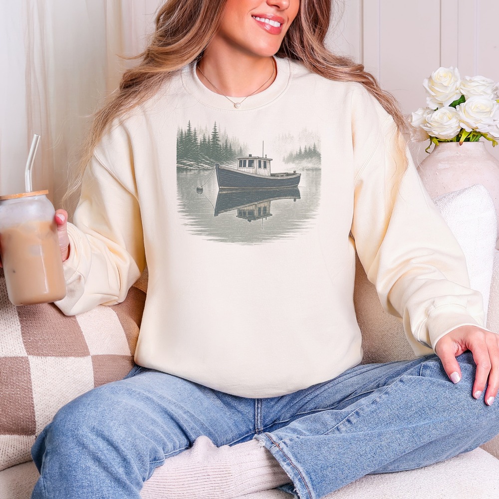Solitary Boat Resting in the Misty Cove Sweatshirt